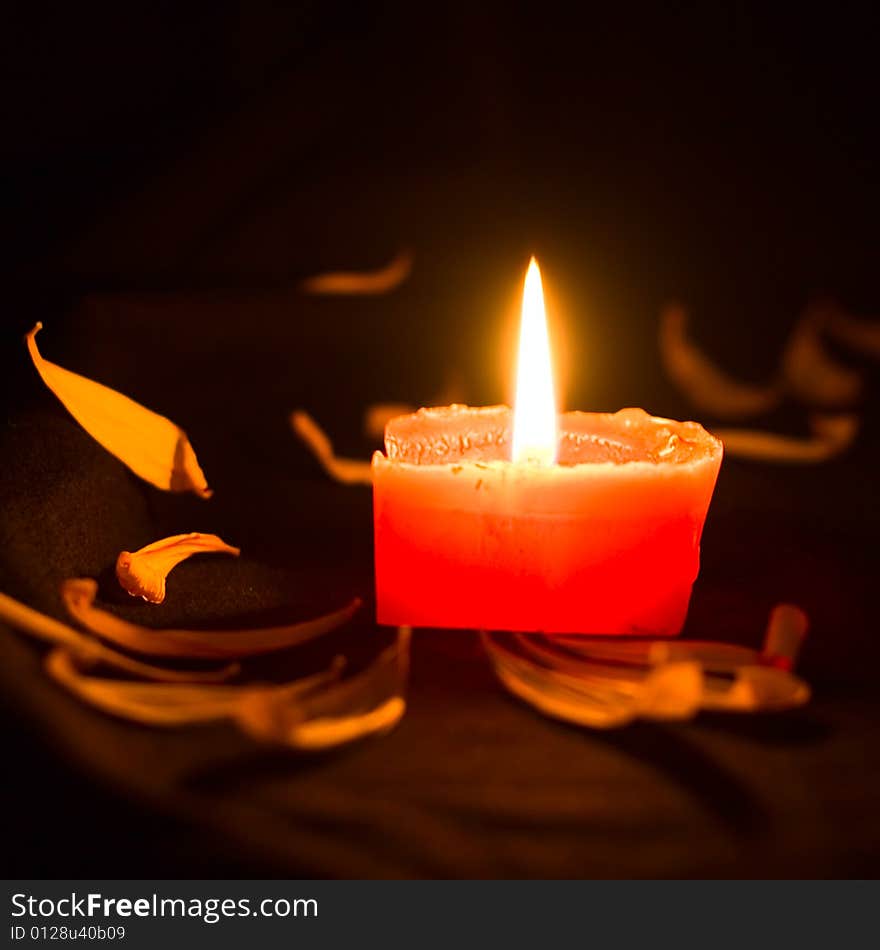 Fire candle on black background for your design