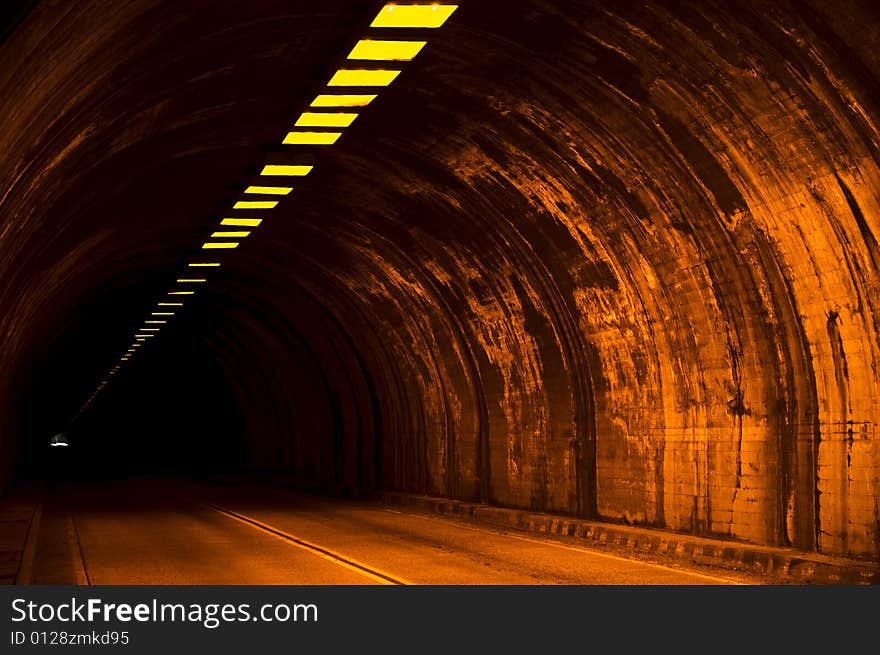 Tunnel capture with light at the end. Camera used was a Nikon D70S with a 18-70mm lens set to 1/125 sec at f/4.5 without flash and ISO 1600. Tunnel capture with light at the end. Camera used was a Nikon D70S with a 18-70mm lens set to 1/125 sec at f/4.5 without flash and ISO 1600