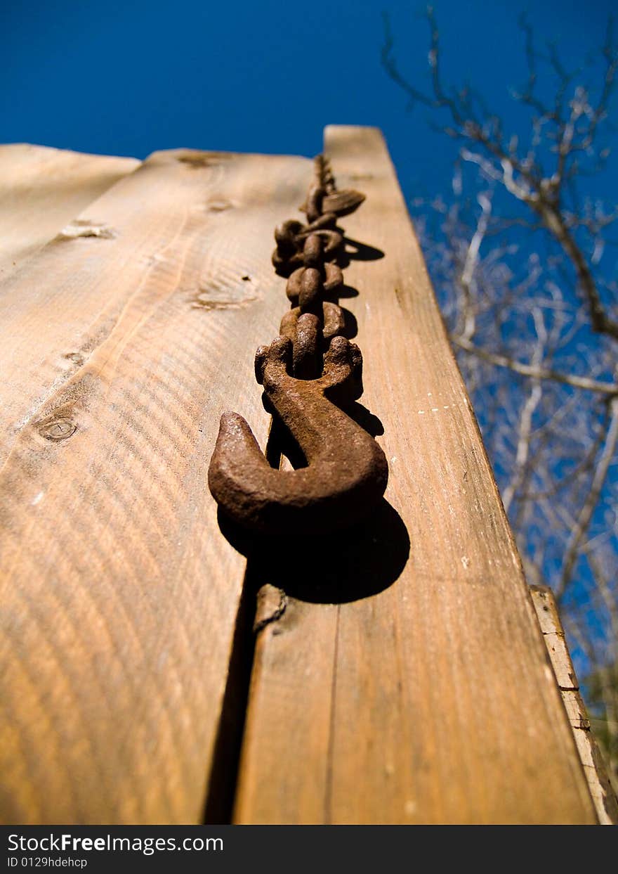 Chain hanging from a fence in Julian, CA