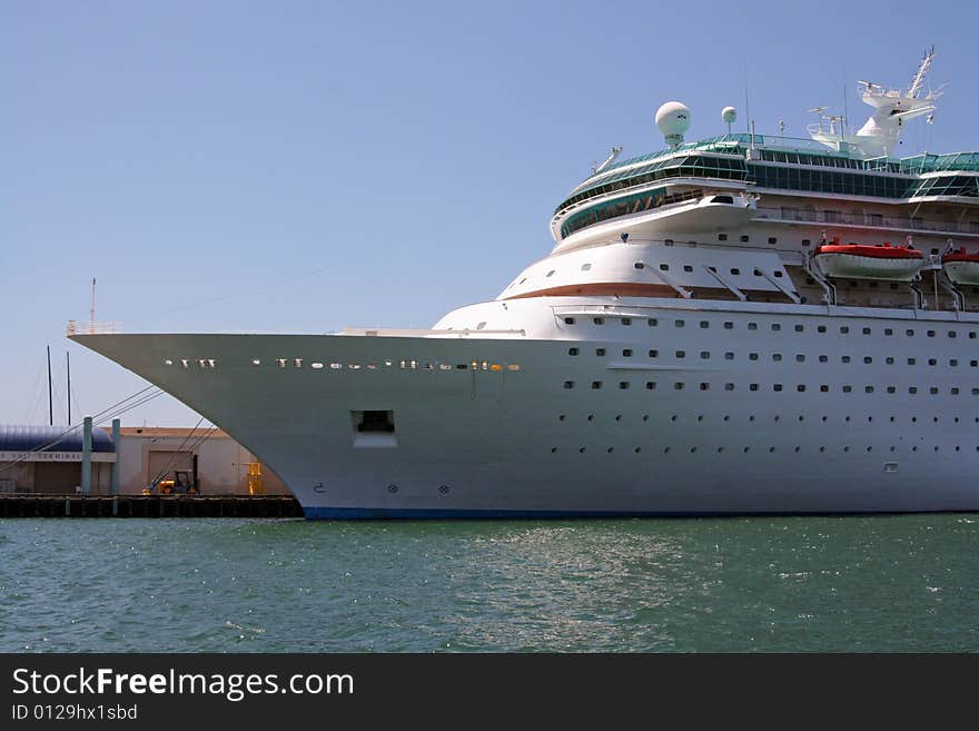 A big cruise ship is docked at the bay in San Diego, California.