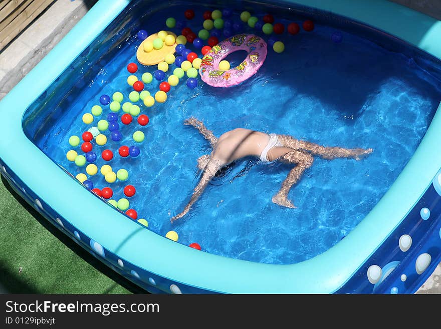 A big blue swimming pool