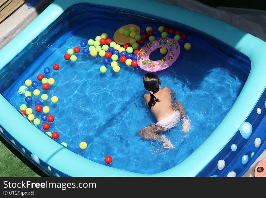 A big blue swimming pool