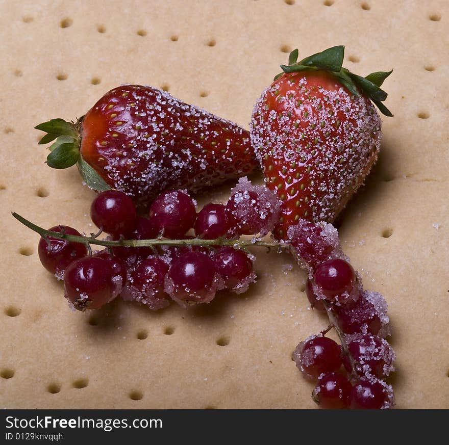 Tart shell with caster sugar strawbwrries and red currant. Tart shell with caster sugar strawbwrries and red currant