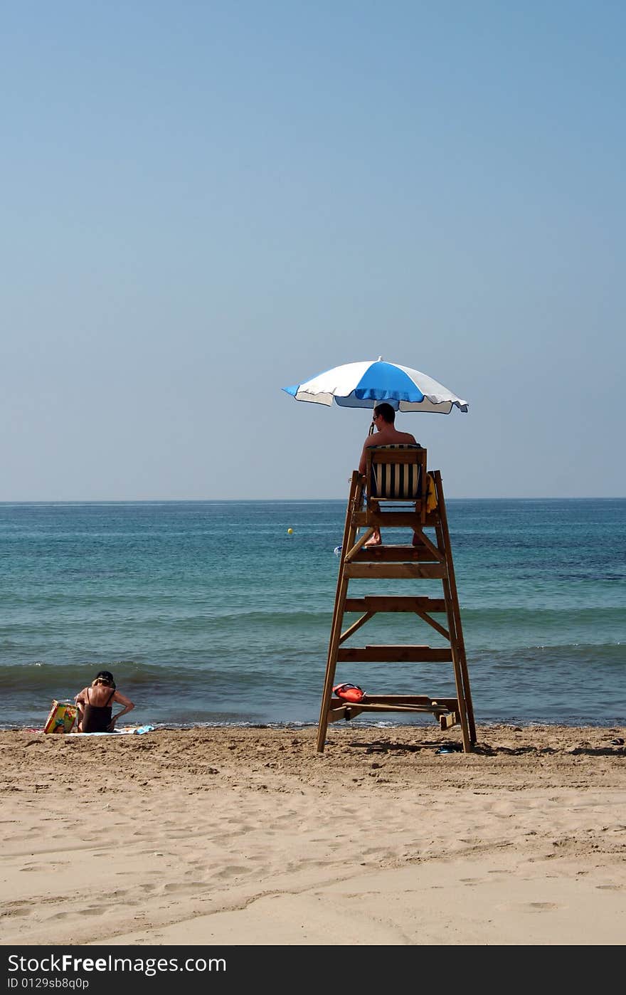 Life guard watching on the sea. Life guard watching on the sea