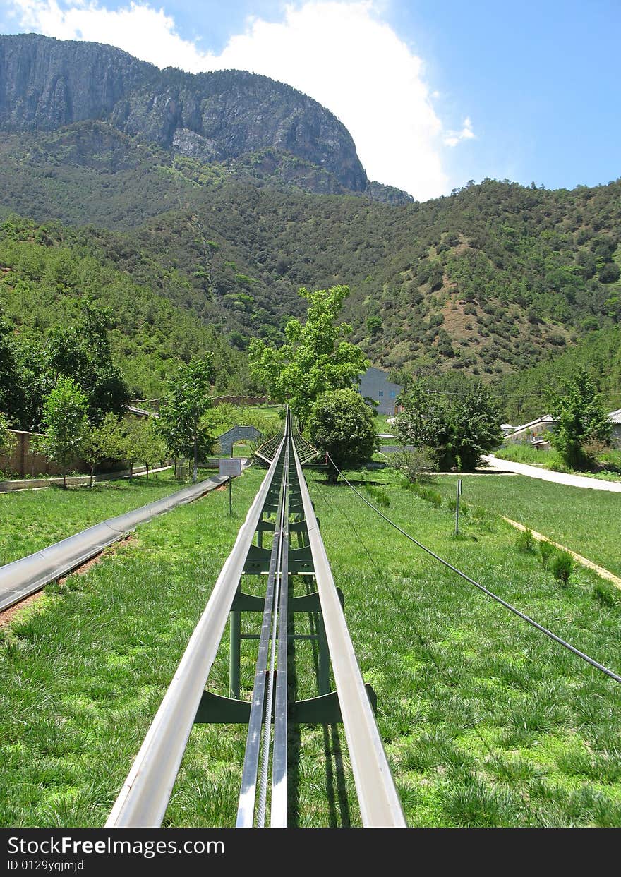 Chinese road in Yunan province, going to Lugu Lake. Chinese road in Yunan province, going to Lugu Lake