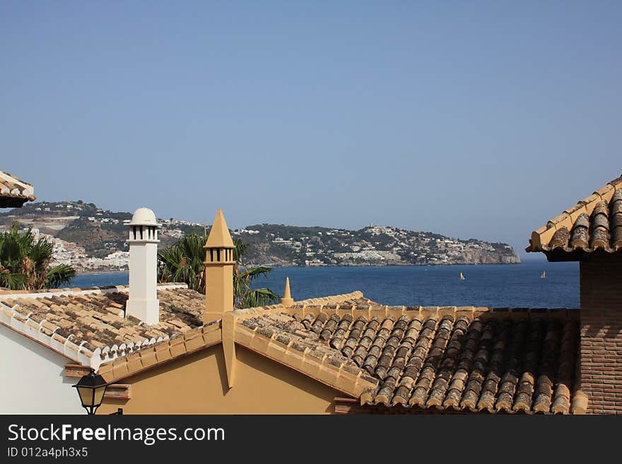 Sea View Over Rooftops