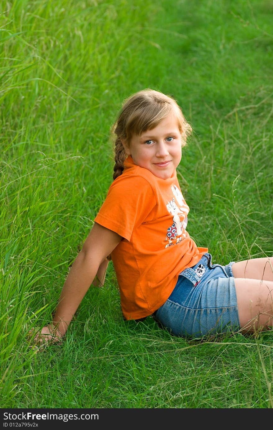 Girl sit on grass