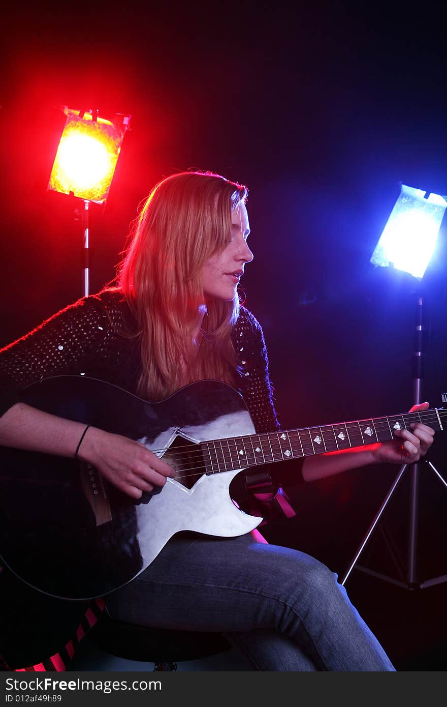 Woman Playing Guitar