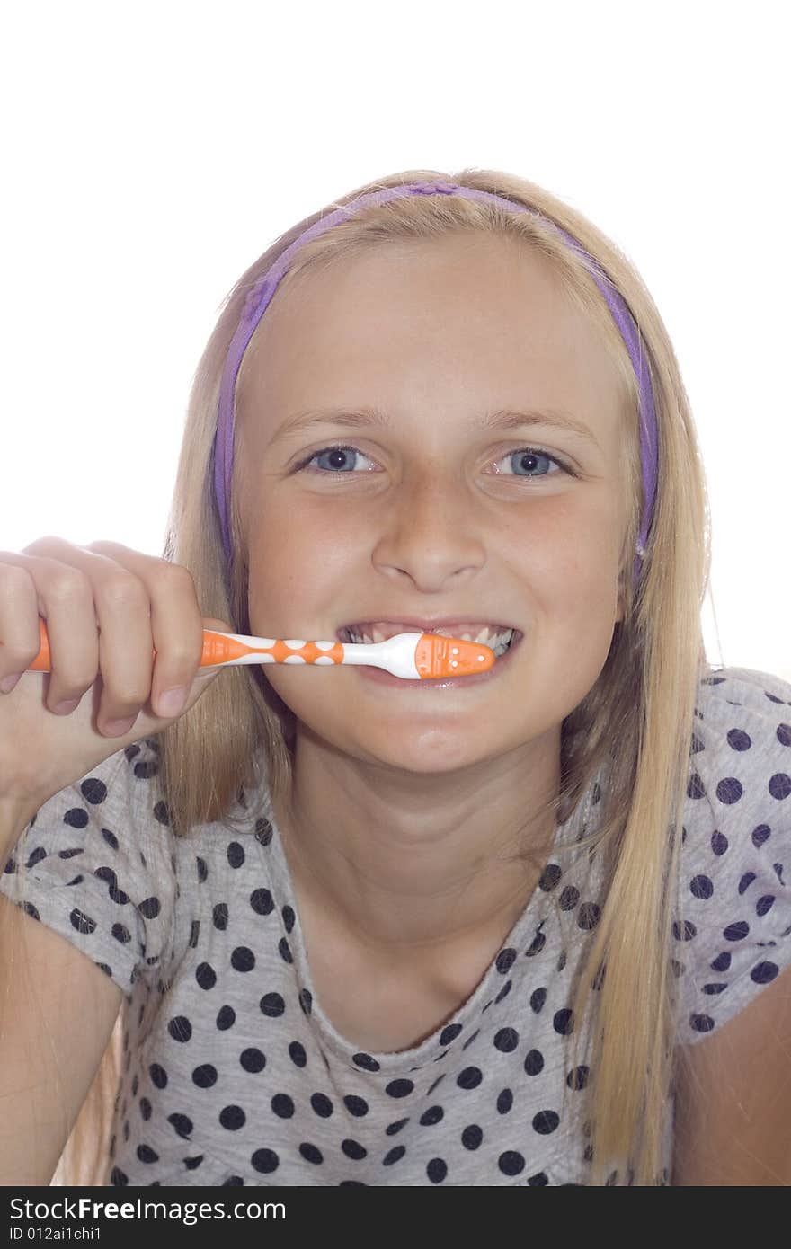 Young Teenager Girl Cleaning Tooth