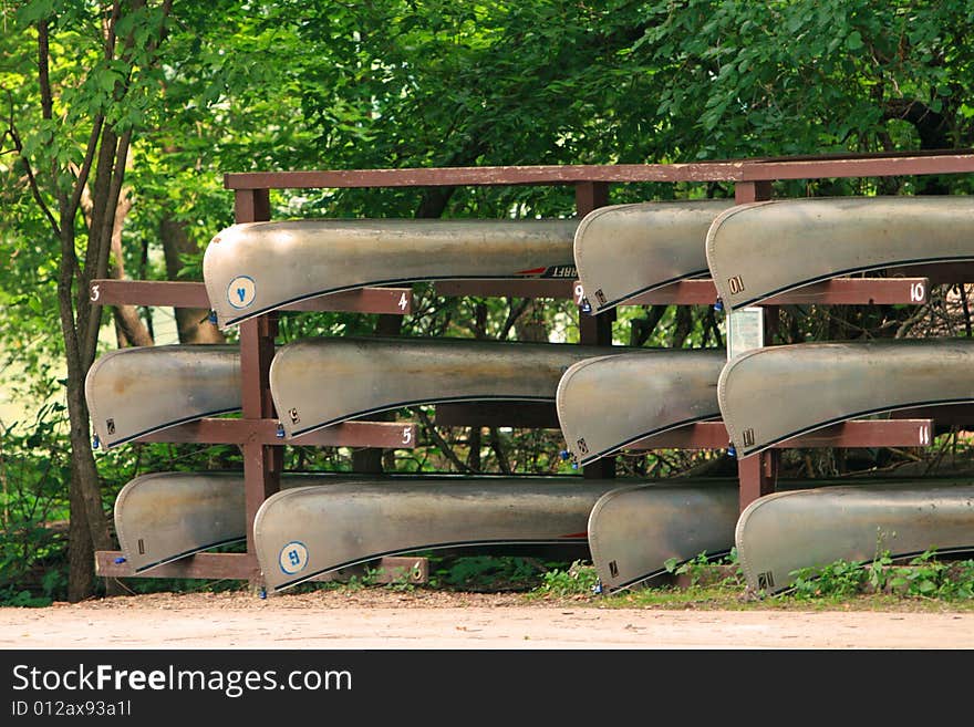 Bunch of canoes waiting to be rented. Bunch of canoes waiting to be rented