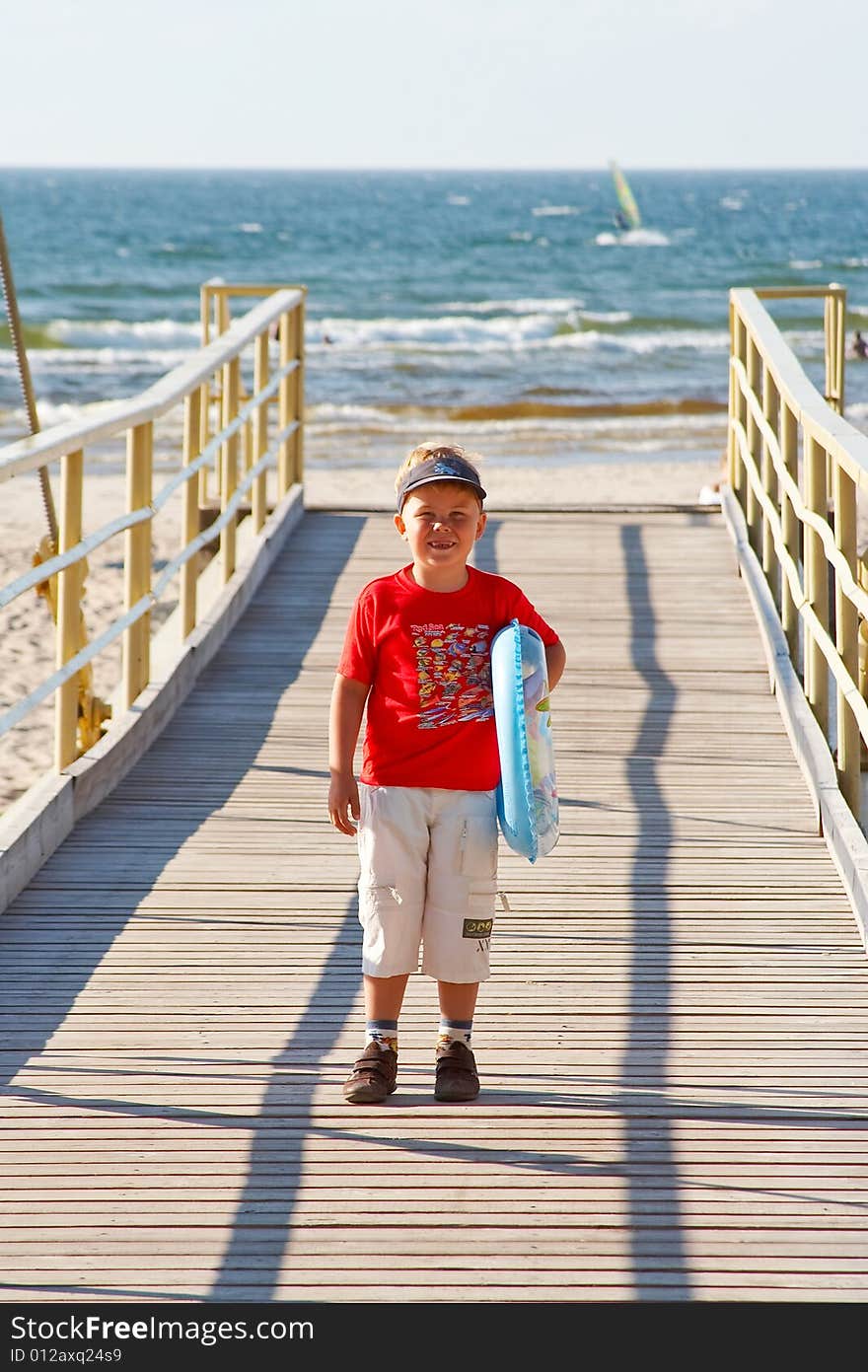 Little Boy With A Buoy