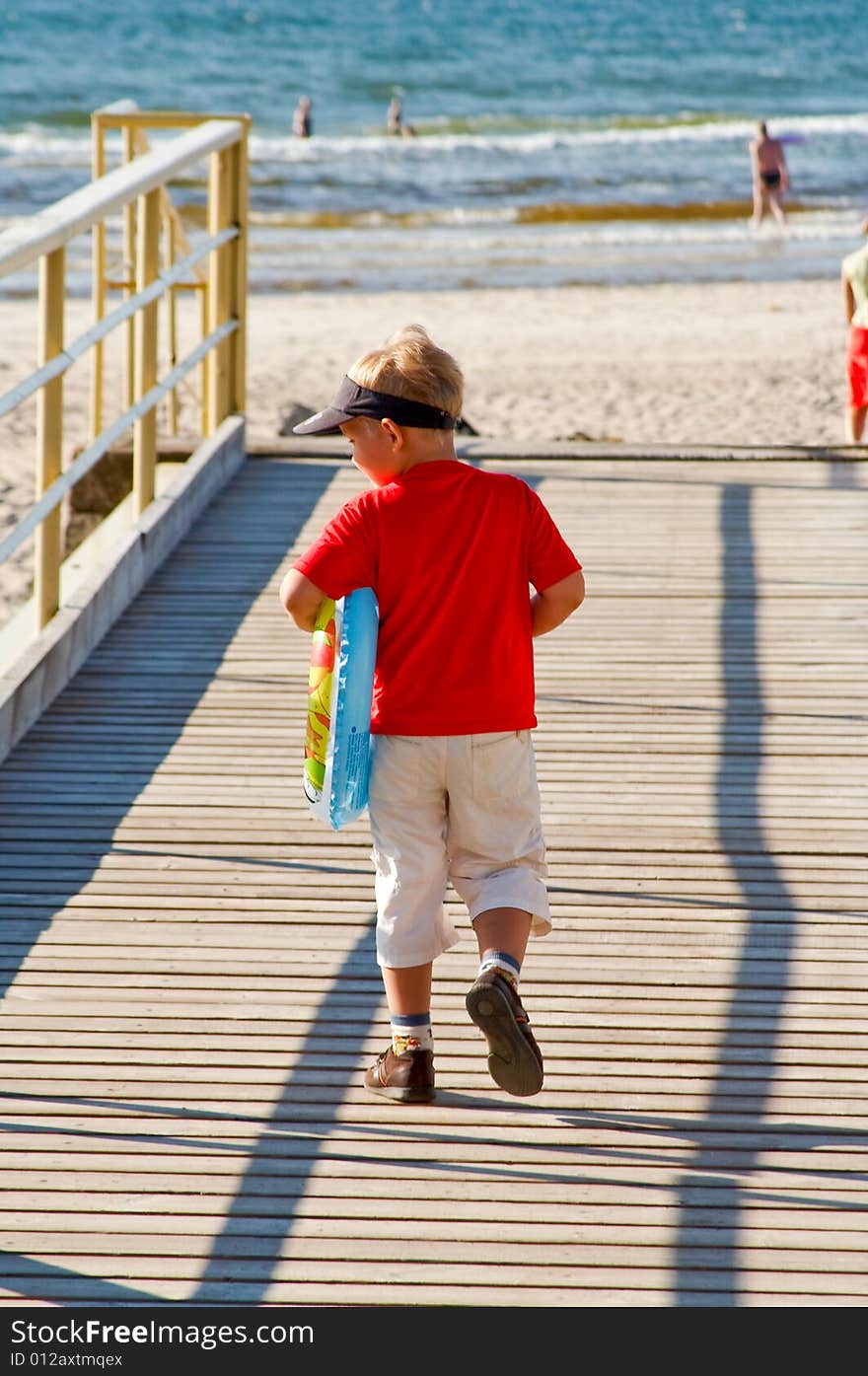 Little boy on a bridge