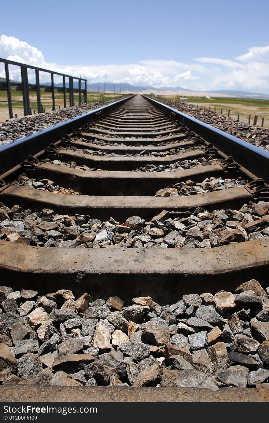 This railway is straight, and it is so long. This railway is straight, and it is so long.