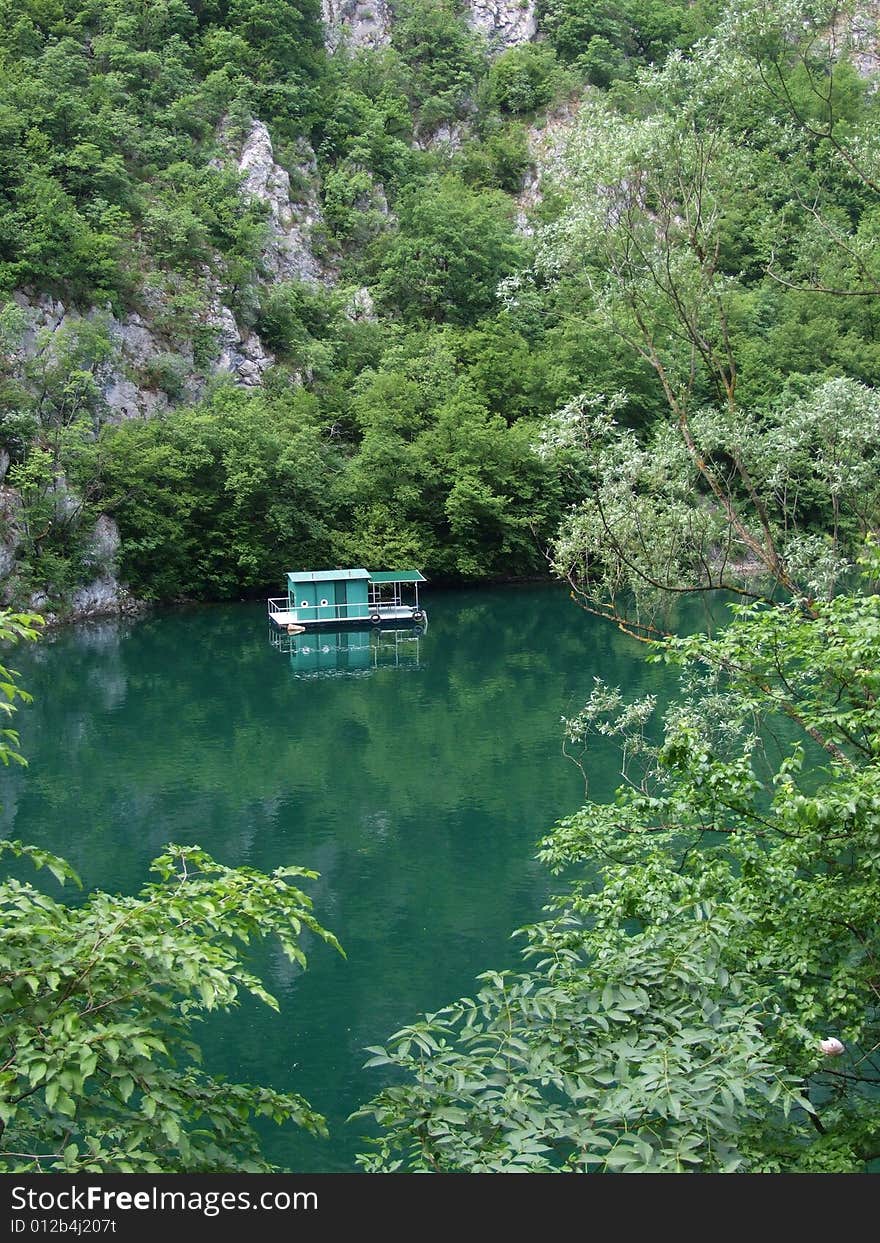 Floating house on lake.