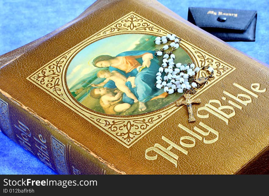Vintage Holy Bible Circa 1966 with vintage Rosary Beads.