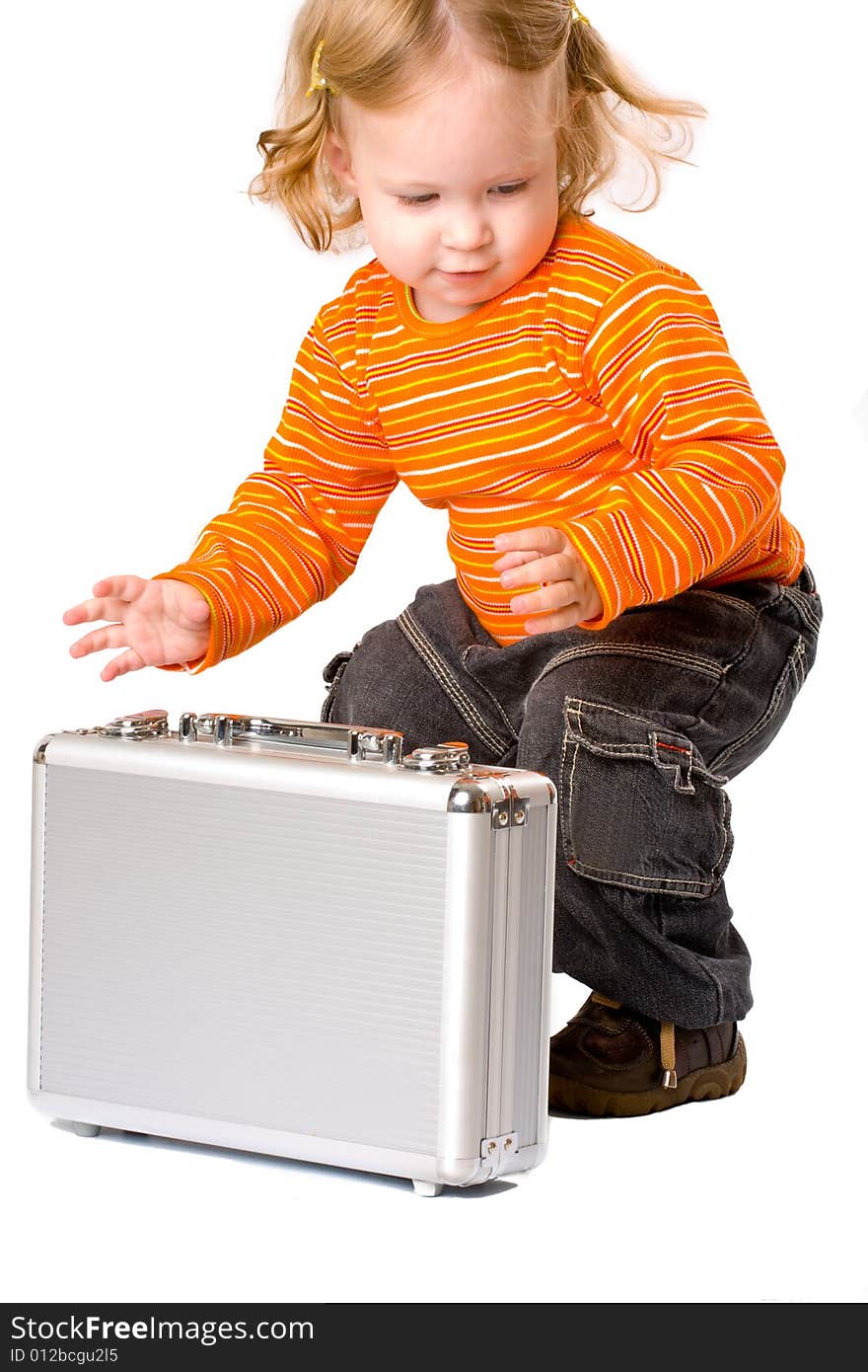 Close-up of pretty baby with suitcase, isolated over white