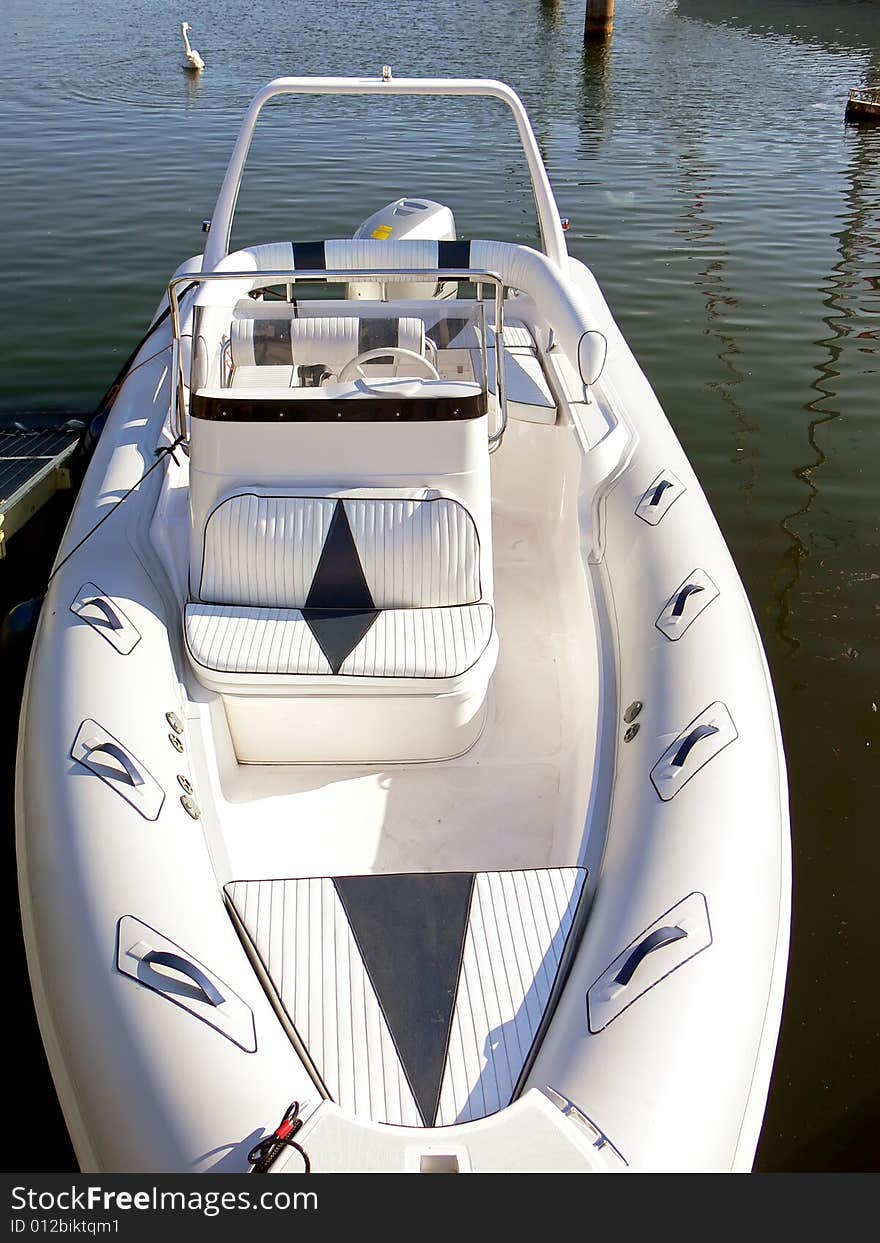 Beautiful motor boat in the harbour. Beautiful motor boat in the harbour.