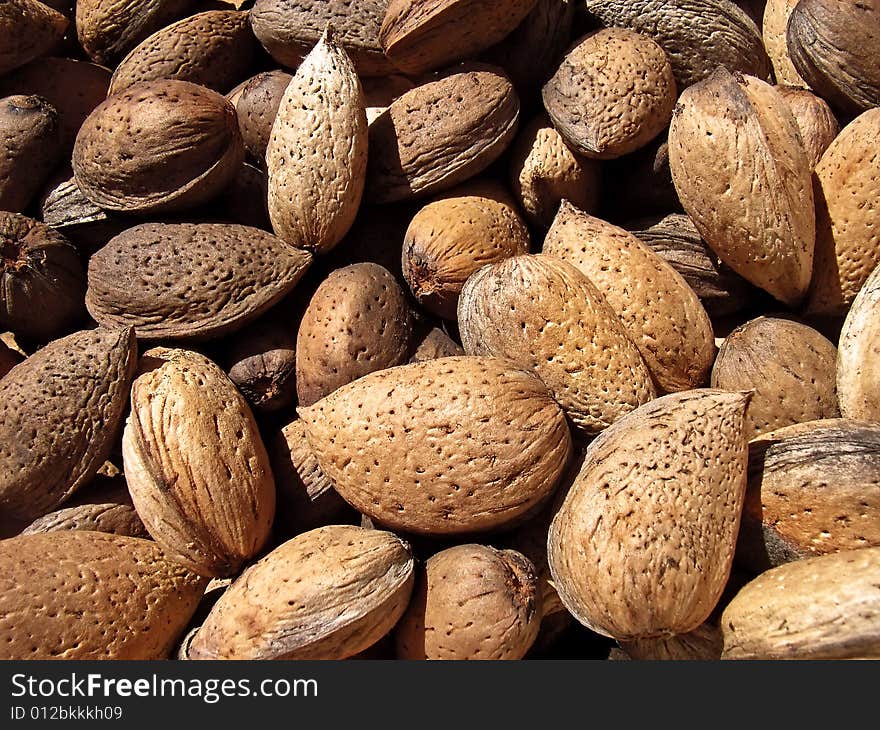 Several almonds in a basket