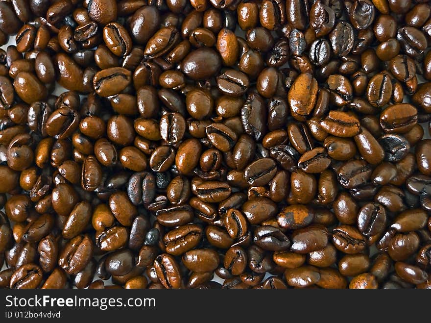 Closeup shot of coffee beans filling whole frame