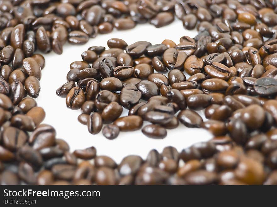 Letter C framed by coffee beans