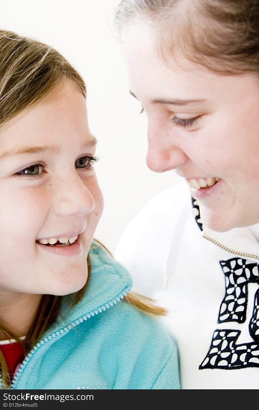 Mother and daughter laughing together