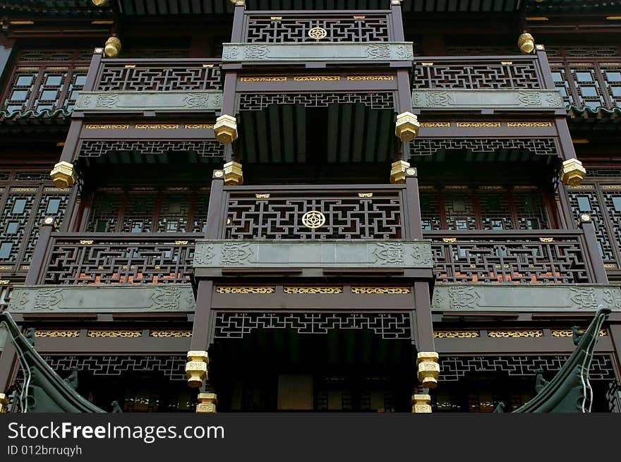 China, Shanghai city. Traditional, ancient Chinese architecture, made of wood. Pagoda in old town called YuYuan (Cheng Huang Miao). China, Shanghai city. Traditional, ancient Chinese architecture, made of wood. Pagoda in old town called YuYuan (Cheng Huang Miao).