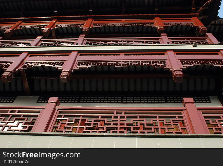 China, Shanghai city. Traditional, ancient Chinese architecture, made of wood. Pagoda in old town called YuYuan (Cheng Huang Miao). China, Shanghai city. Traditional, ancient Chinese architecture, made of wood. Pagoda in old town called YuYuan (Cheng Huang Miao).