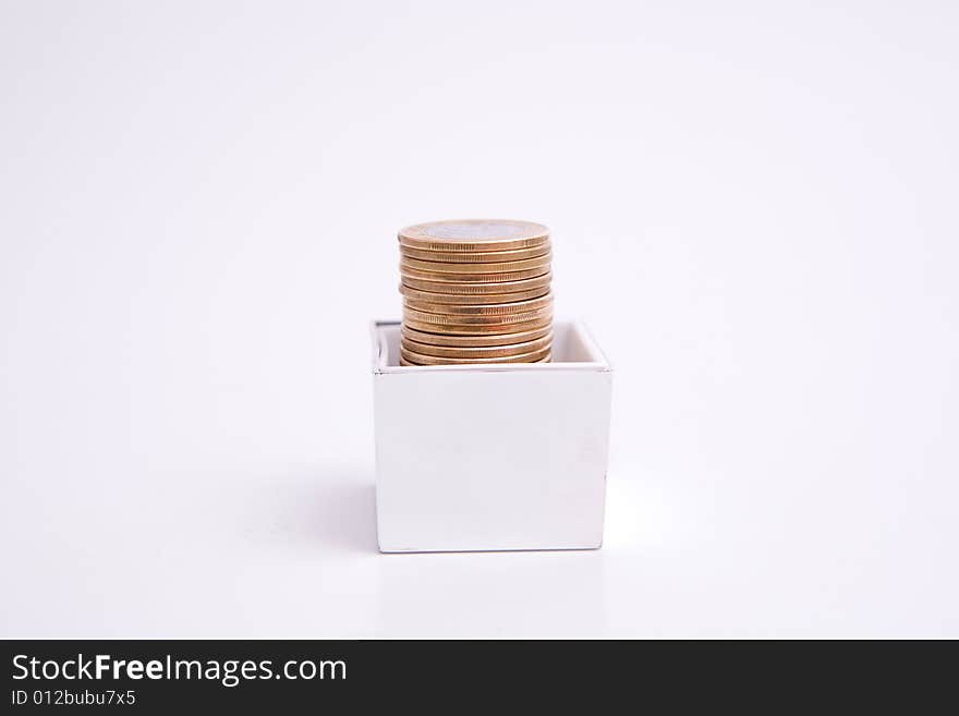 Box to gift and coin on the white background