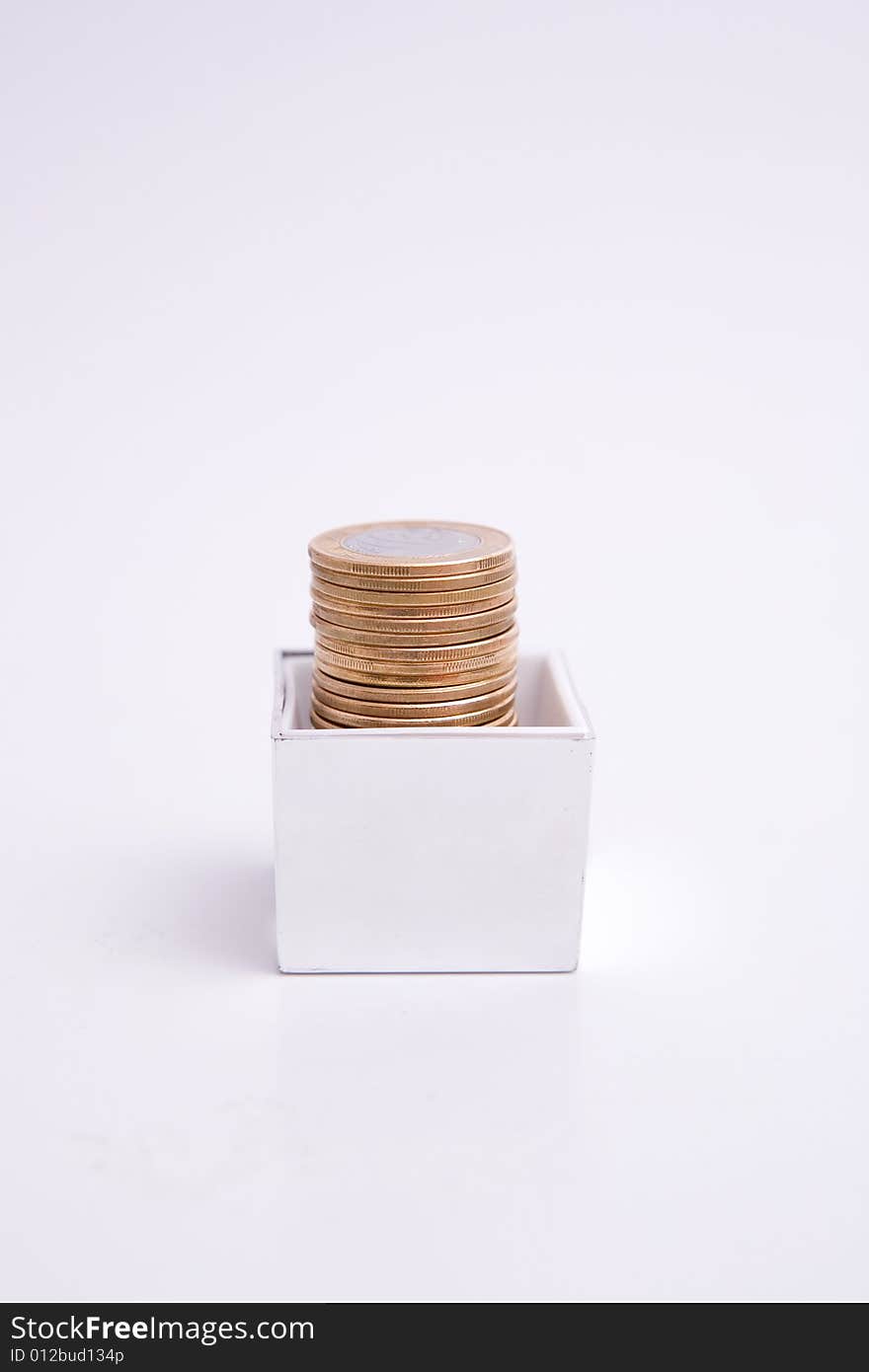 Box to gift and coin on the white background