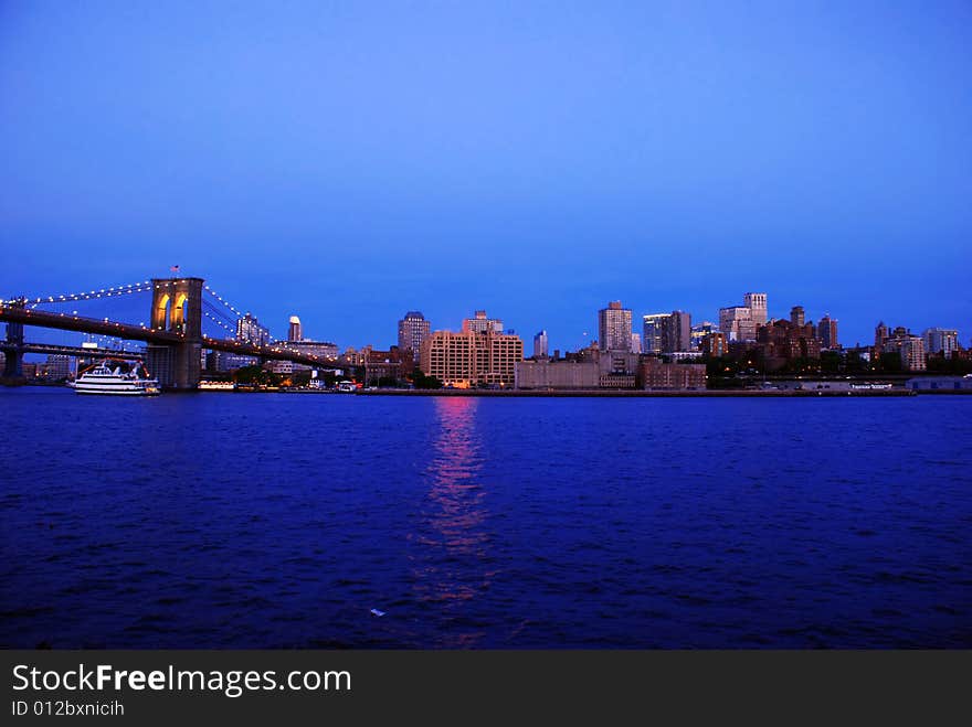 Fragment of Brooklyn Bridge in evening New York City