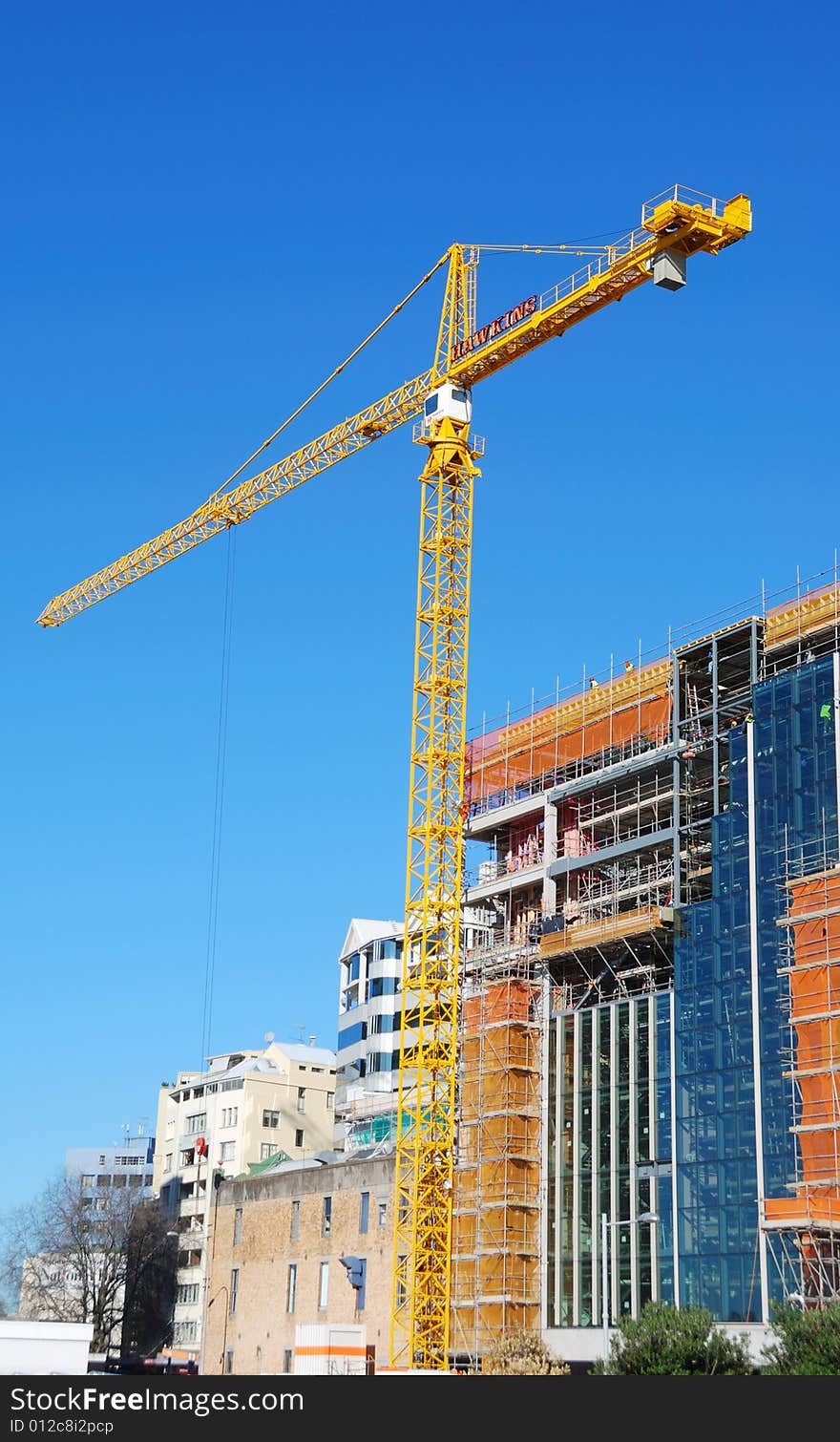 Construction crane with blue sky background