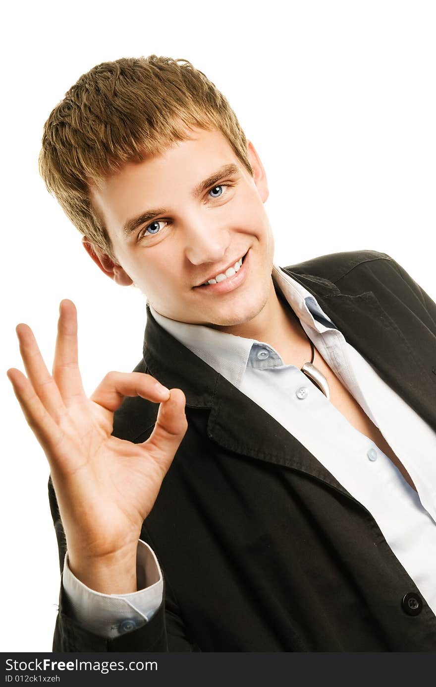 Handsome young man showing ok gesture. Isolated on white background