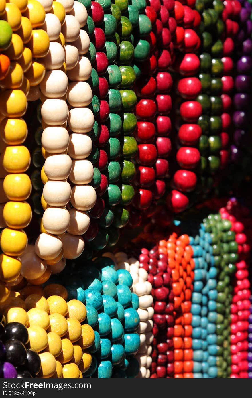 Abstract colorful bright wooden beads in street shop. Abstract colorful bright wooden beads in street shop