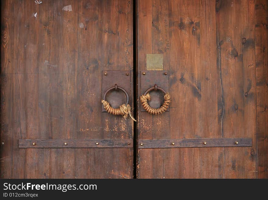 Close-up image of ancient doors