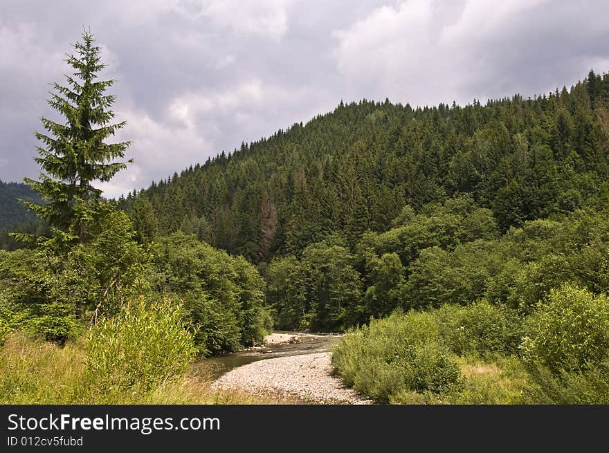 High Dynamic Range image  of mountains and mountain river with in Carpathians. Ukraine. High Dynamic Range image  of mountains and mountain river with in Carpathians. Ukraine