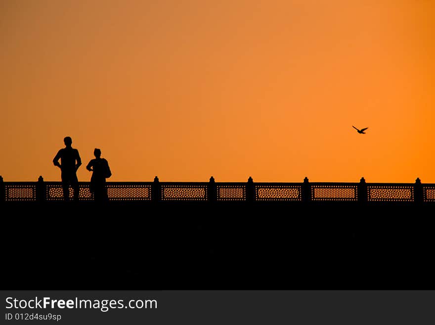 A couple and the sunset in New Delhi. A couple and the sunset in New Delhi