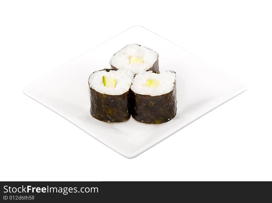 A square white plate with three pieces of sushi