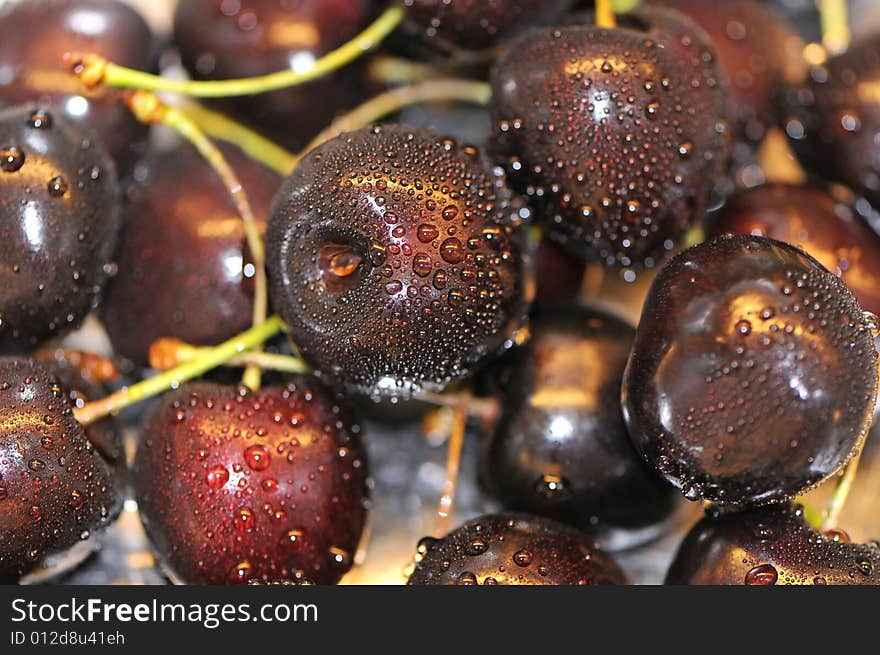 Close up of sweet fresh cherry with water drops. Close up of sweet fresh cherry with water drops