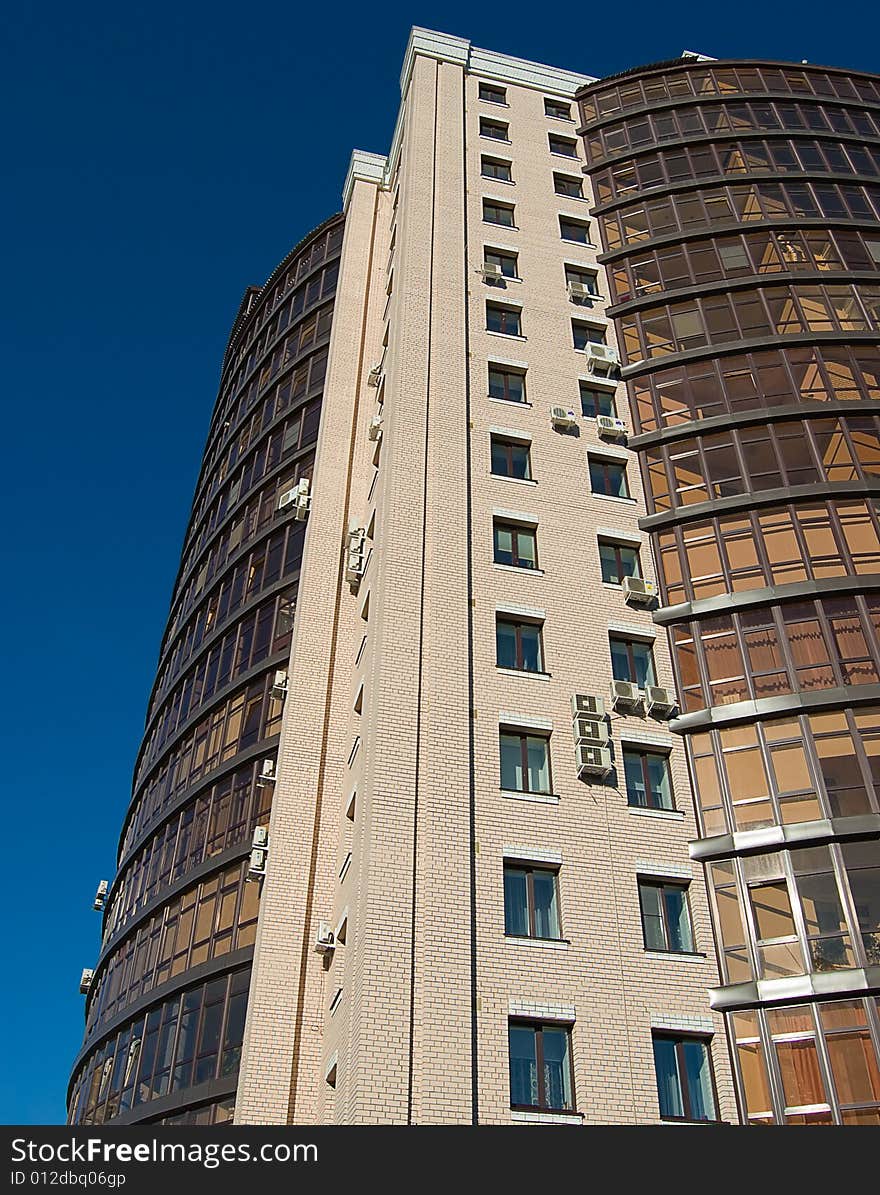 Large business center building in a bright sunny day. Large business center building in a bright sunny day