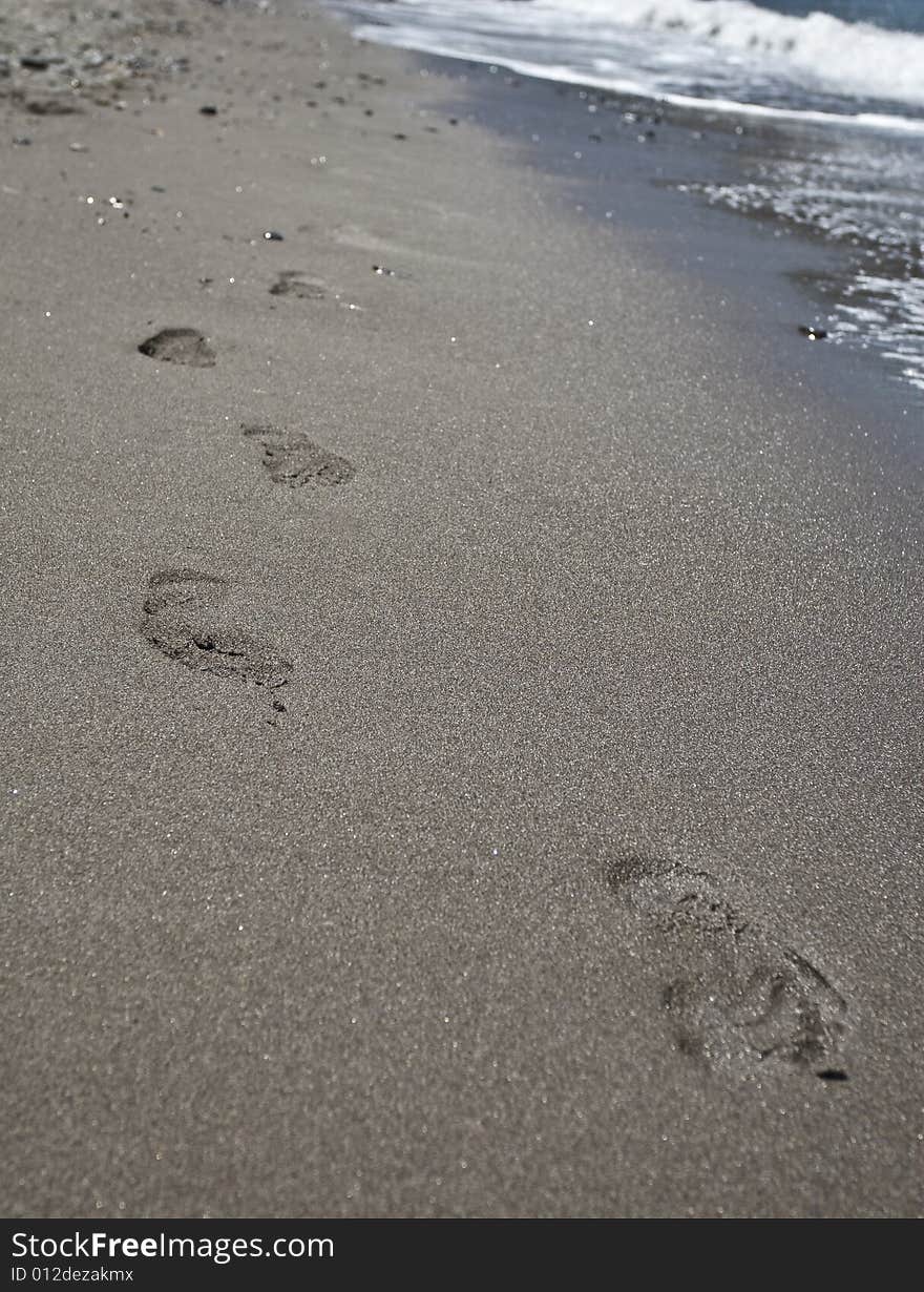 Footsteps On The Beach