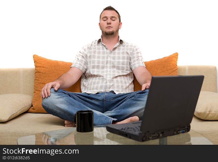 Happy man sitting on sofa with laptop. Happy man sitting on sofa with laptop