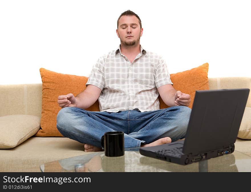 Happy man sitting on sofa with laptop. Happy man sitting on sofa with laptop