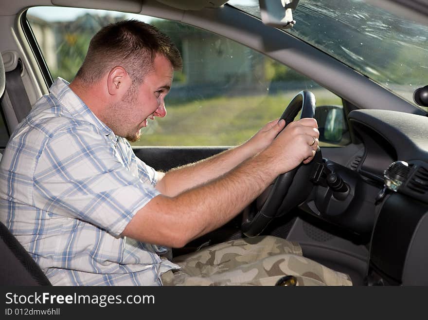 Happy man traveling by car. Happy man traveling by car