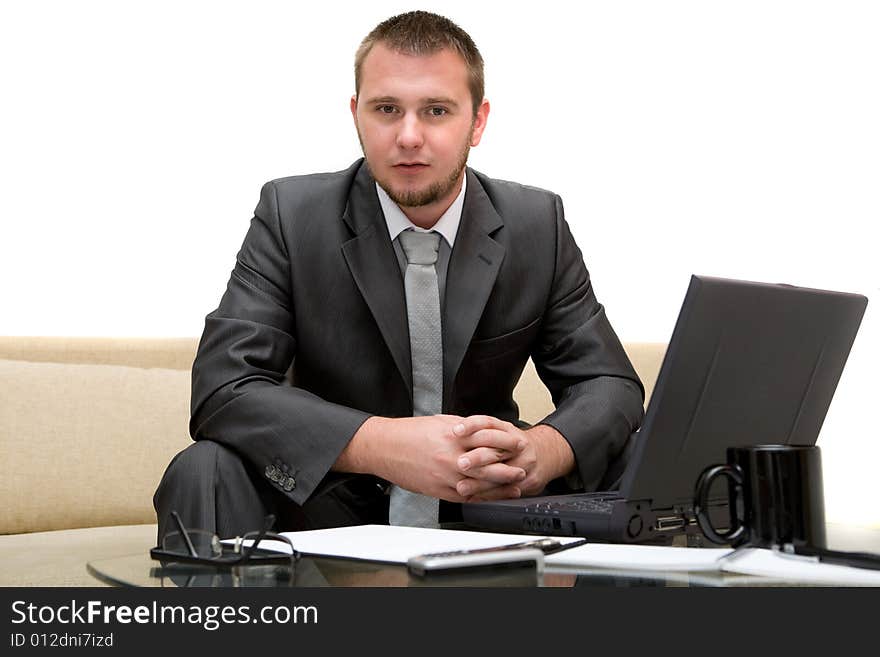 Happy man sitting on sofa with laptop. Happy man sitting on sofa with laptop