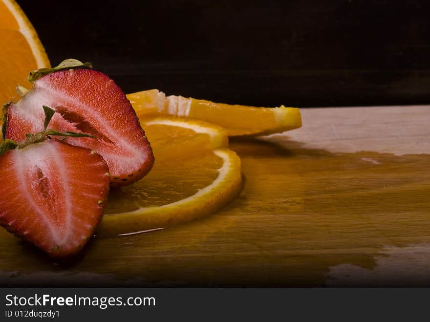 Fruit close up strawberry and orange