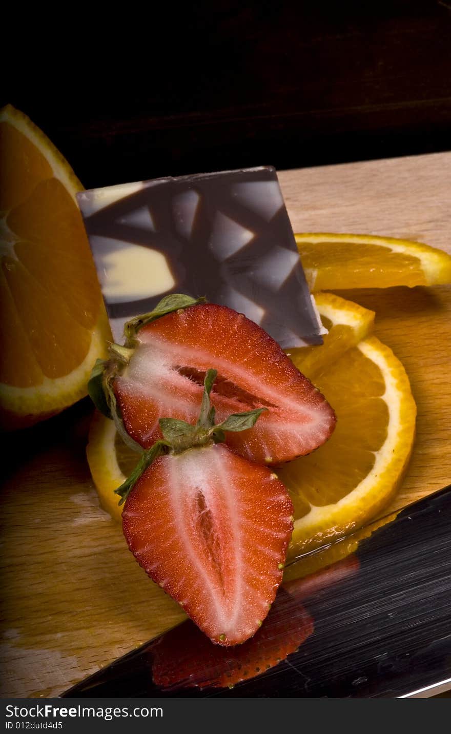 Fruit close up strawberry and orange