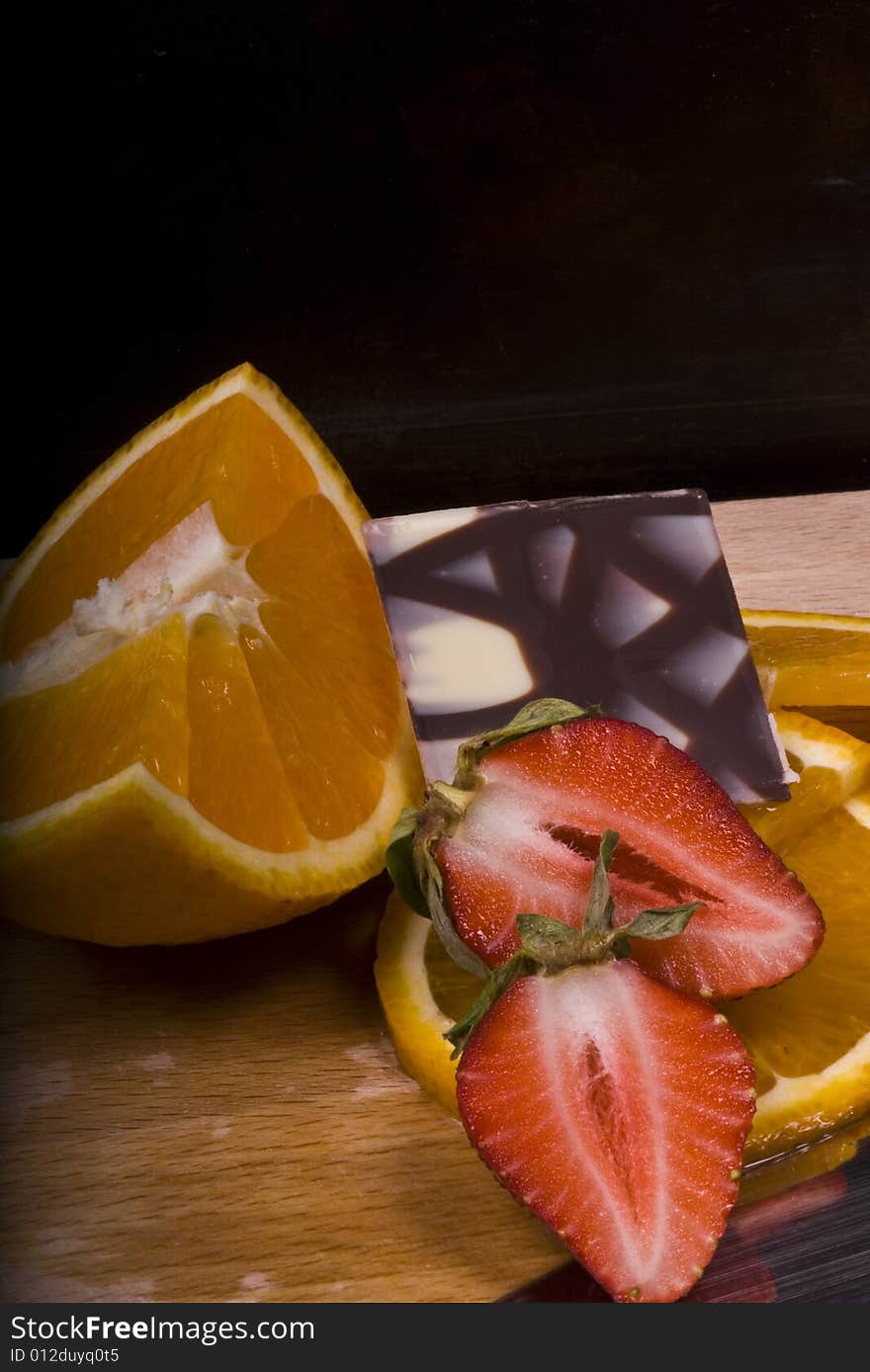 Fruit close up strawberry and orange