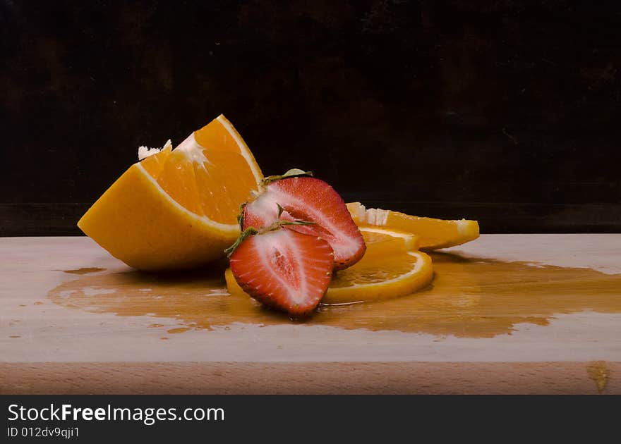 Fruit close up strawberry and orange