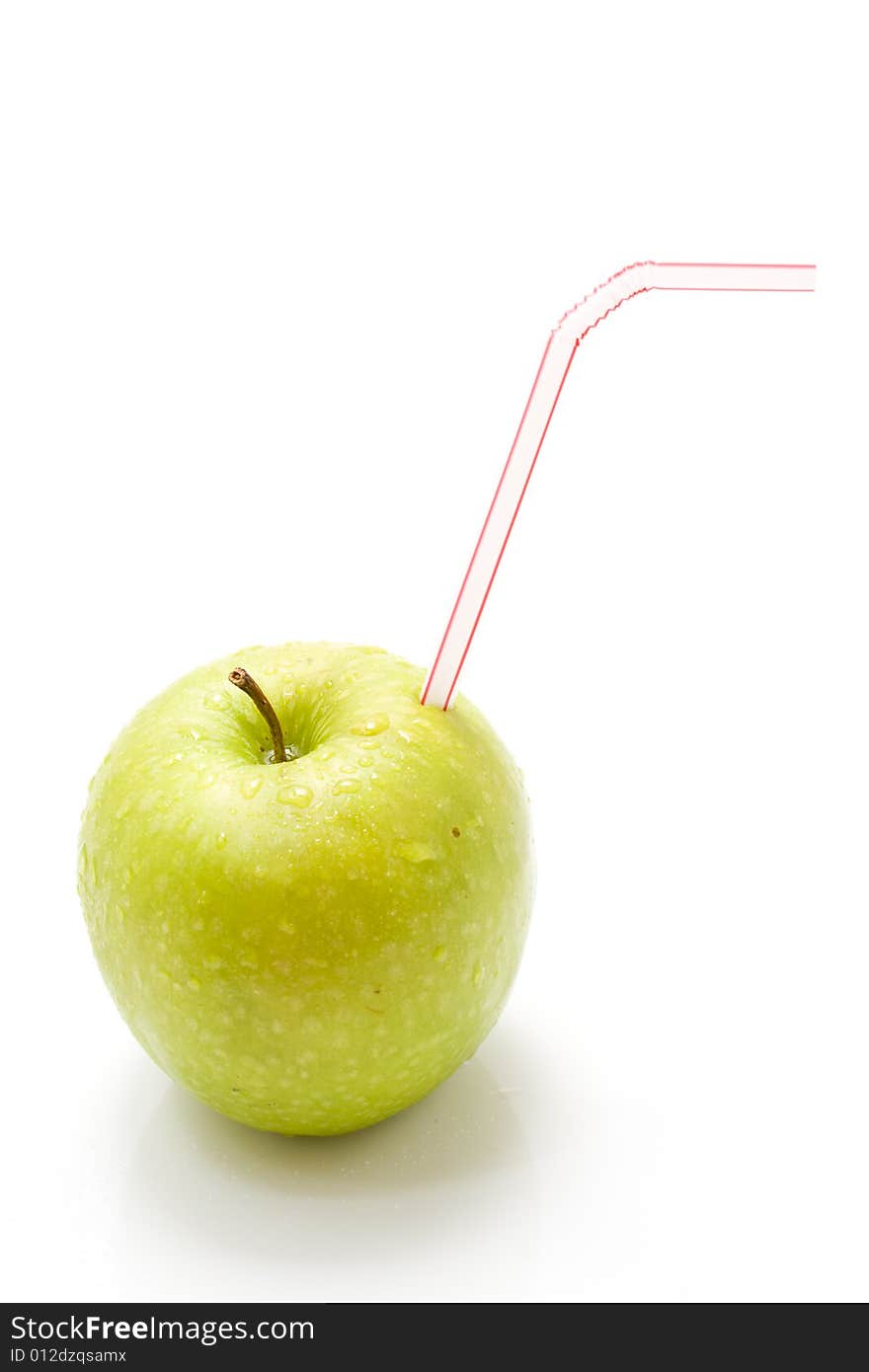 Isolated green apple with straw. Isolated green apple with straw