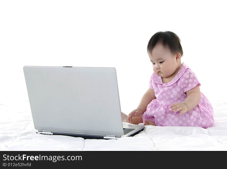 Small baby with laptop isolated. Small baby with laptop isolated